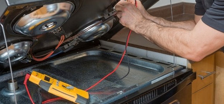 Professional stove repair showing stove diagnostic