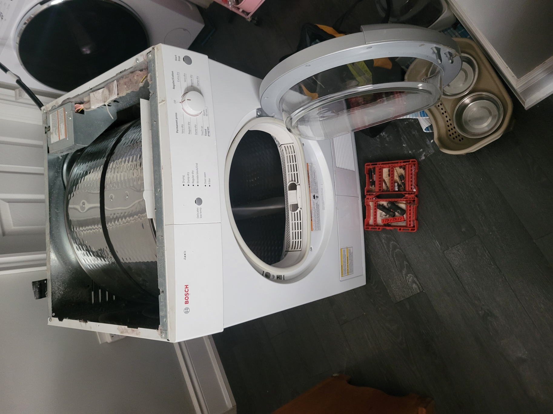 Expert dryer repair showing internal dryer components